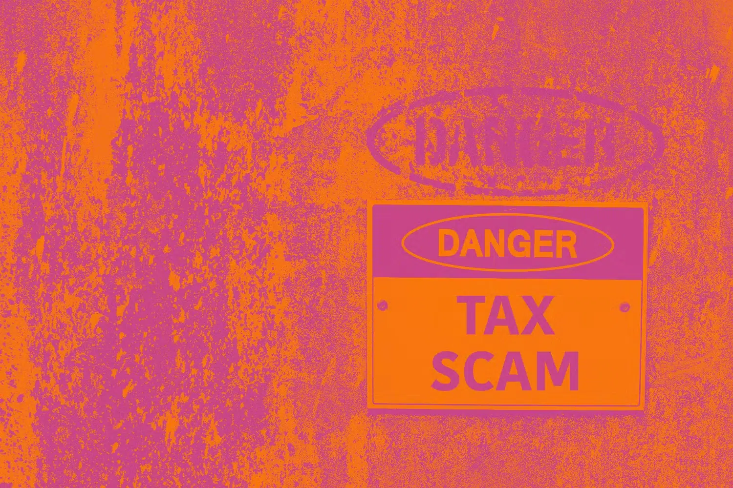 Danger sign with the word "TAX SCAM" written on it