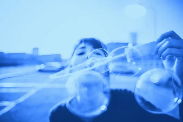 Woman blowing bubbles