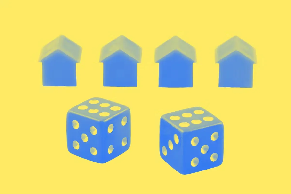 Two dice with homes behind